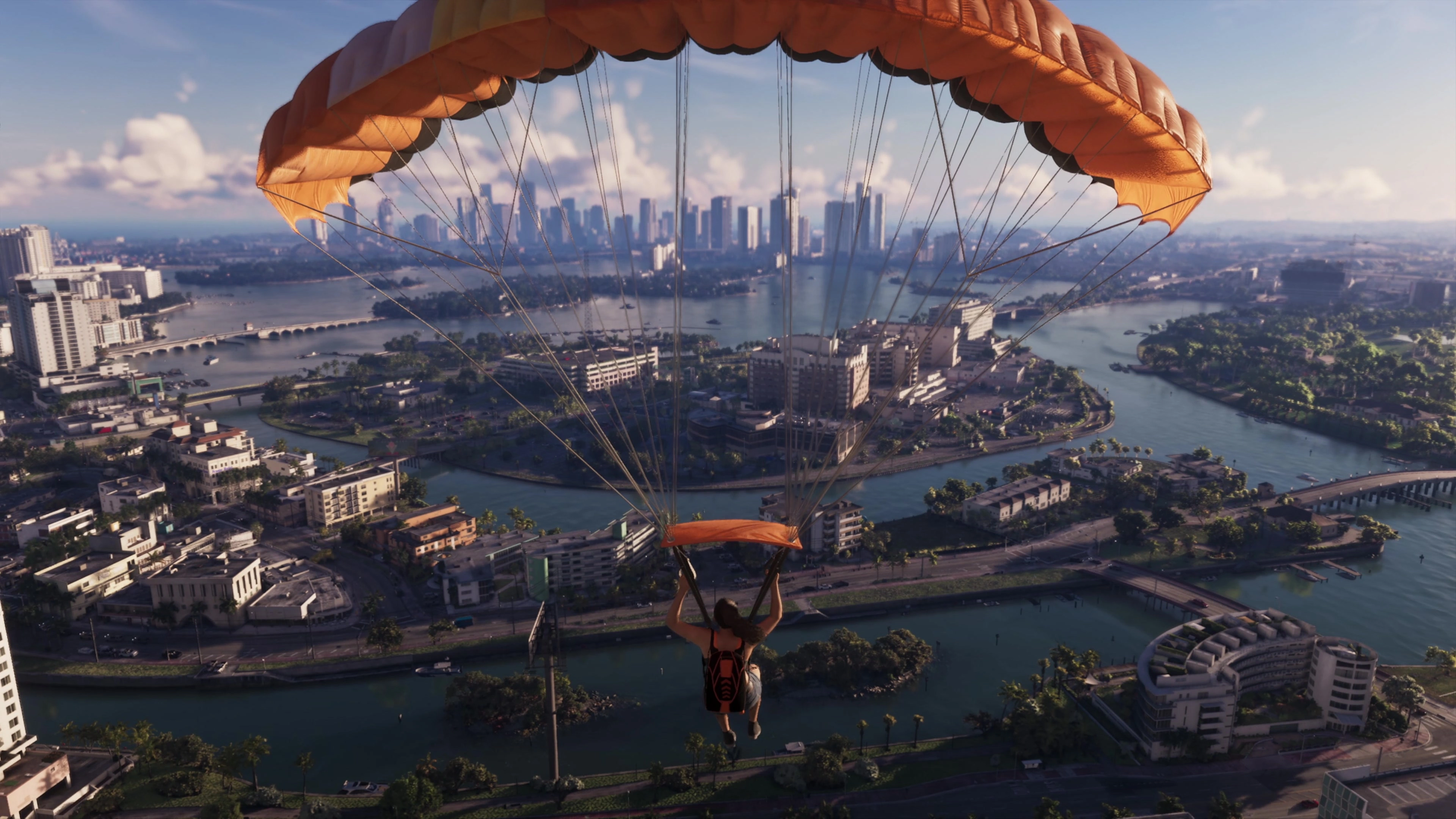 Freefall and an open parachute appear in the official sequence.