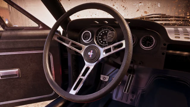 Plano fechado no painel interior e volante do veículo Vapid Dominator Buggy (1967).