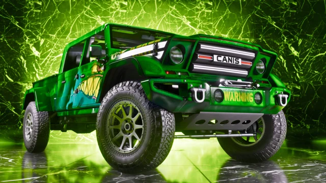 A parked two door green off-road vehicle.