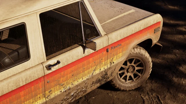 Side view of a beige off-road vehicle with red, orange, and yellow stripes on the side panel.